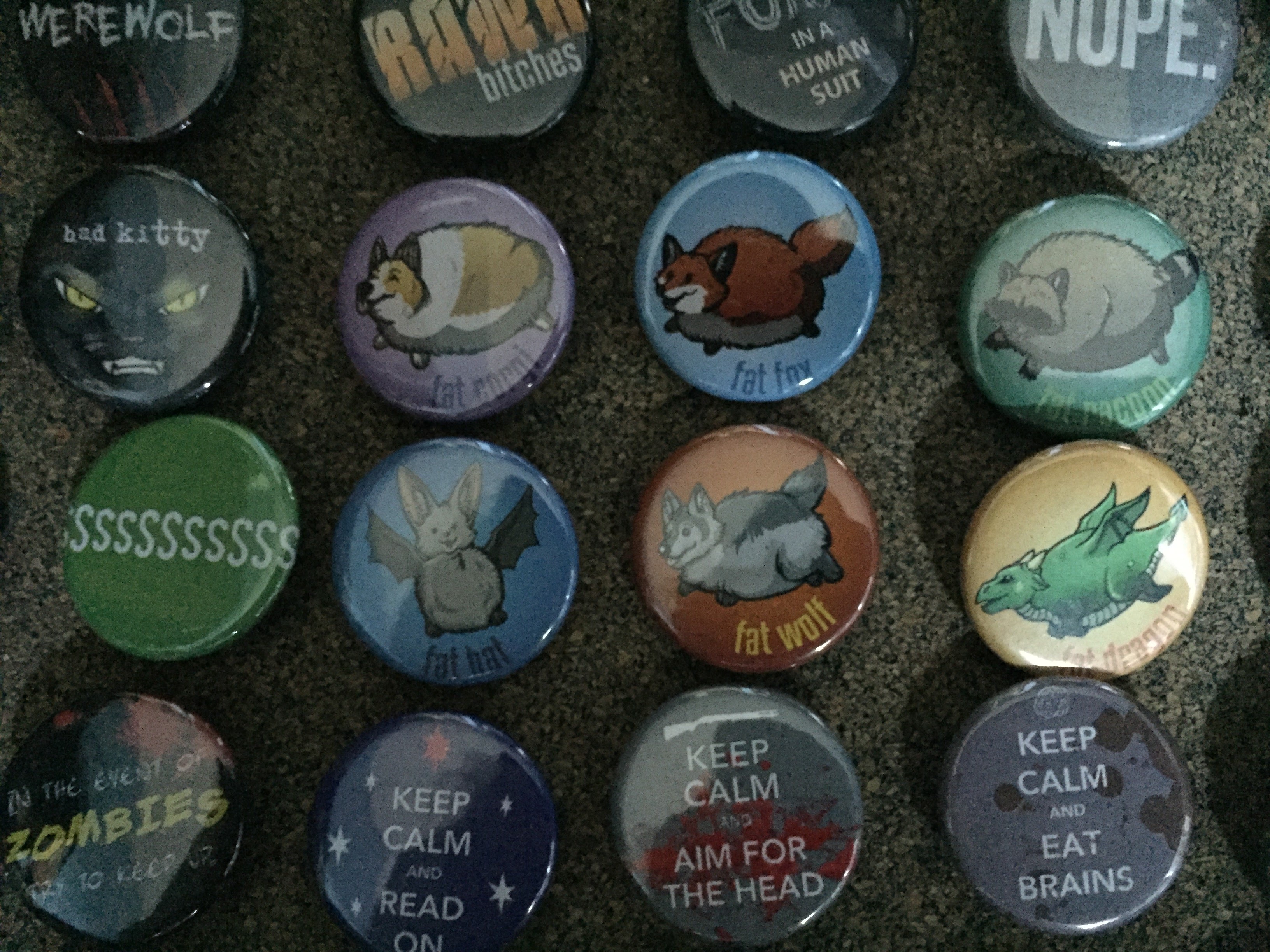 over 150 button designs available as magnets and keychains